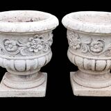 Pair of Medici planters with floral decoration