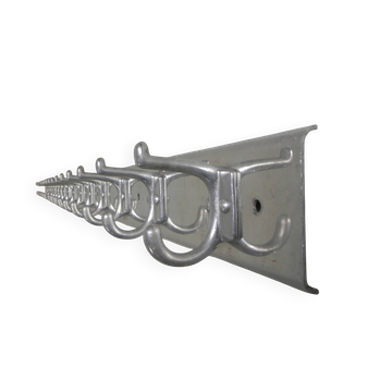Wall-mounted aluminium coat rack of 225 cm with 16 double hooks, 1960s.