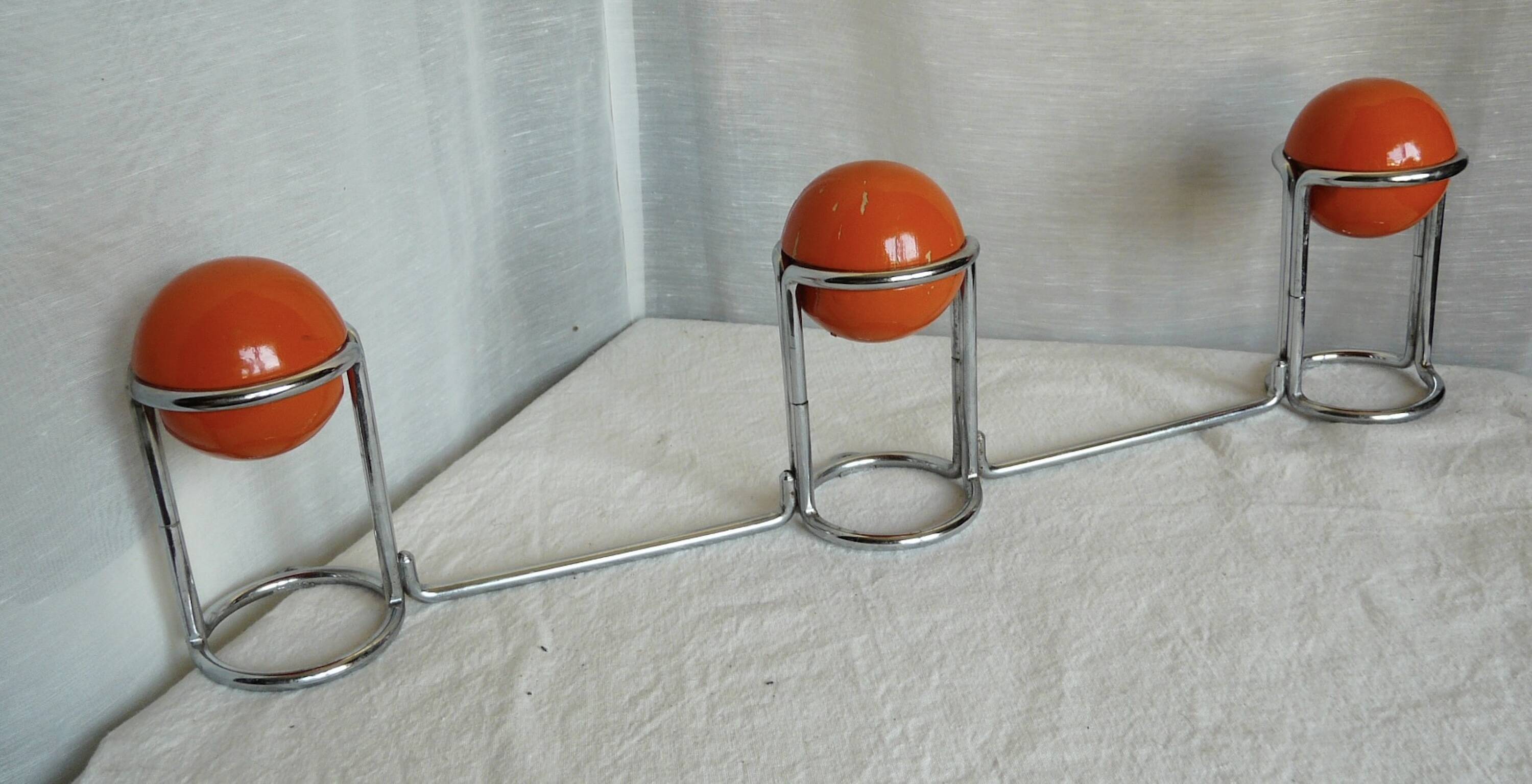 Vintage 1970s orange and chrome coat rack