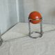 Vintage 1970s orange and chrome coat rack