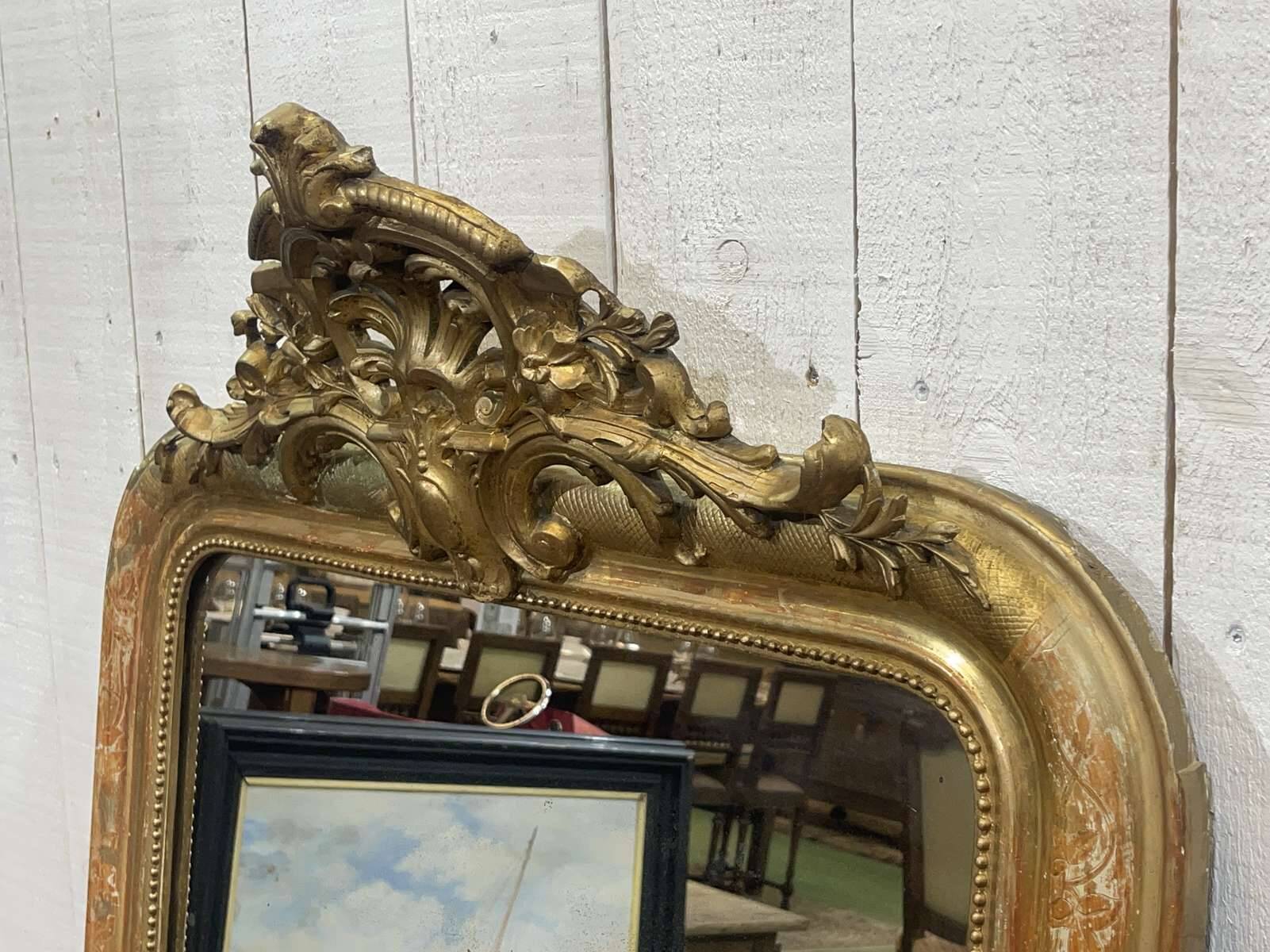 Miroir Louis XV fin XIXème en bois doré
