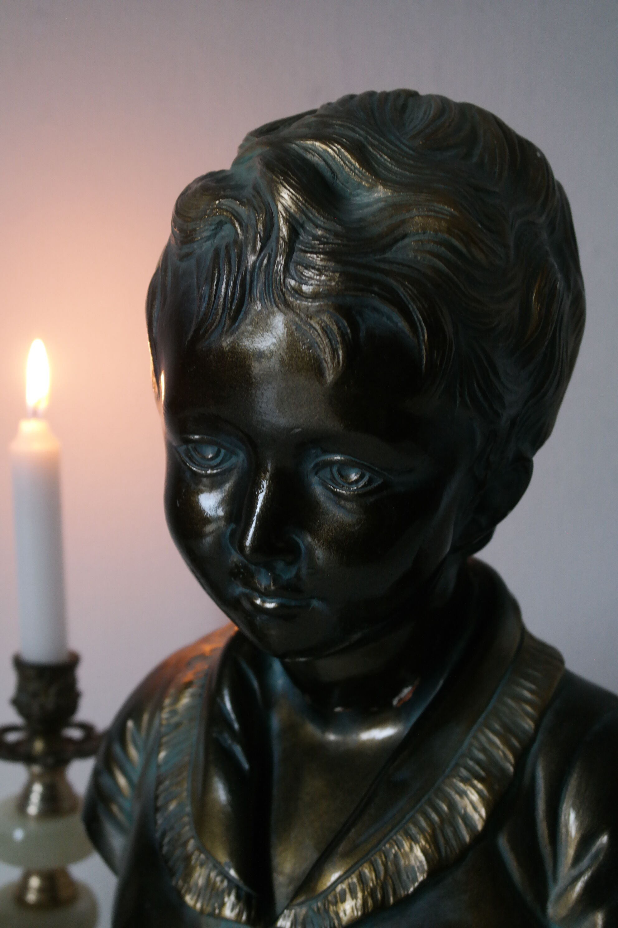 Buste en plâtre garçon patine bronze XXème