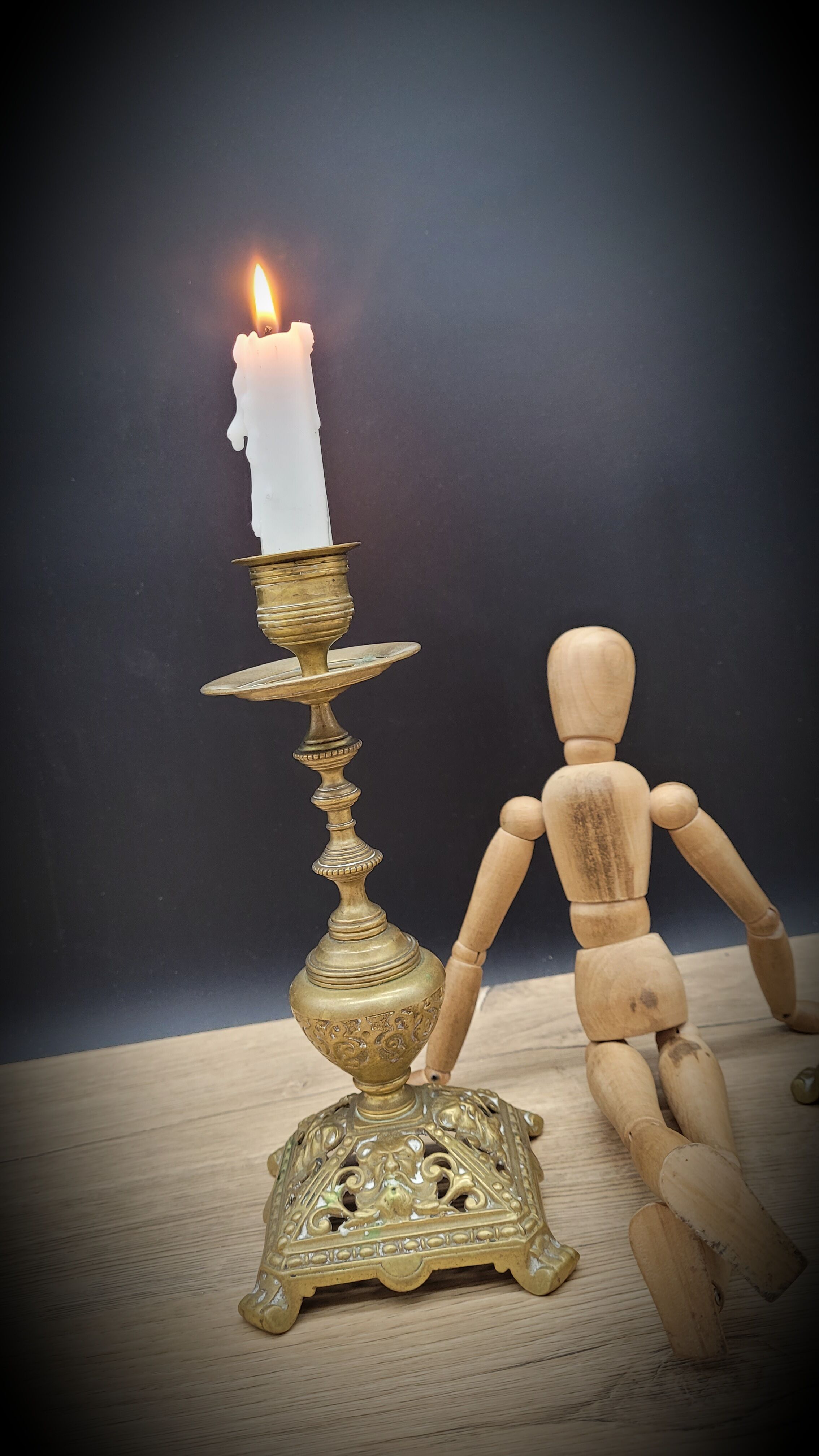 Duo worked brass candle holders