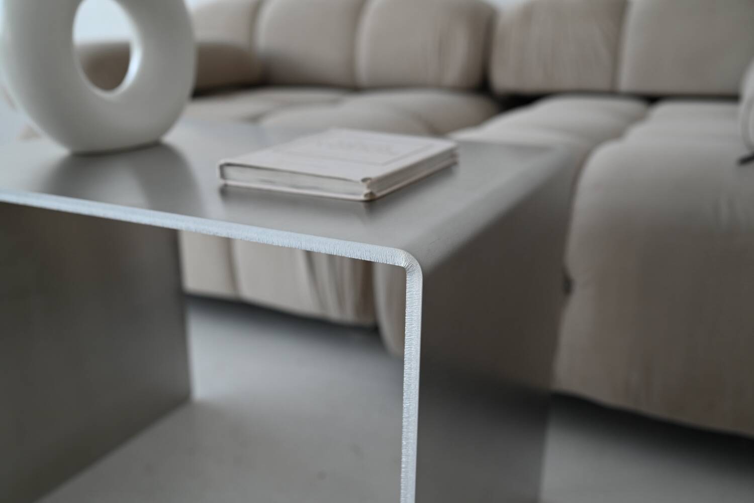 Minimalist brushed aluminum side table