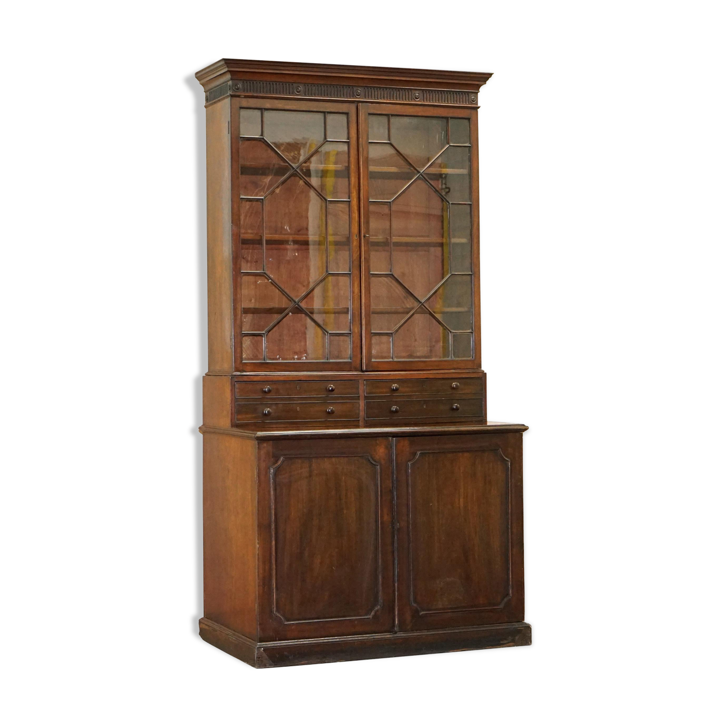 Bibliothèque George IV circa 1820 en bois dur avec tiroirs et vitrage astral