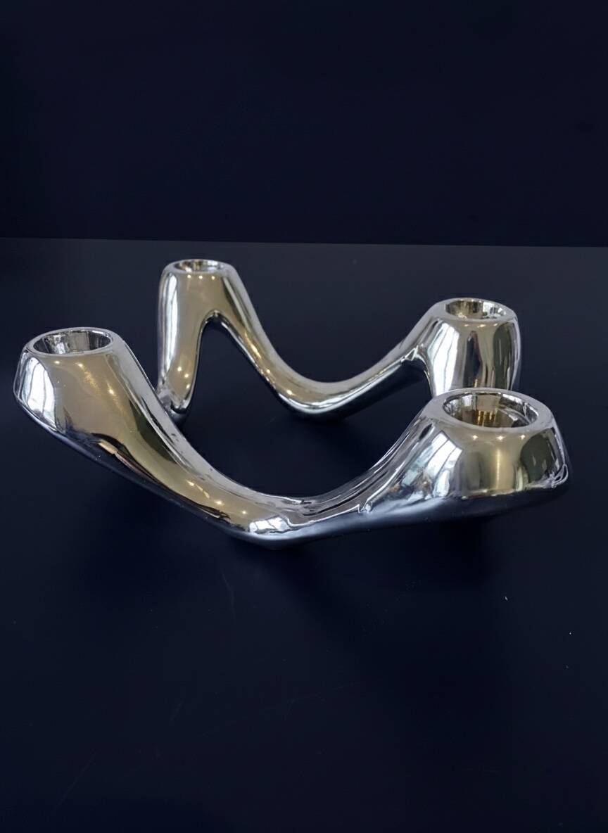 Quatra Chrome candlestick chandelier inspired by "Cobra"