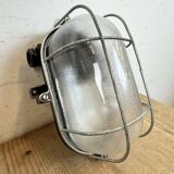 Industrial brown bakelite wall light with frosted glass, 1960s