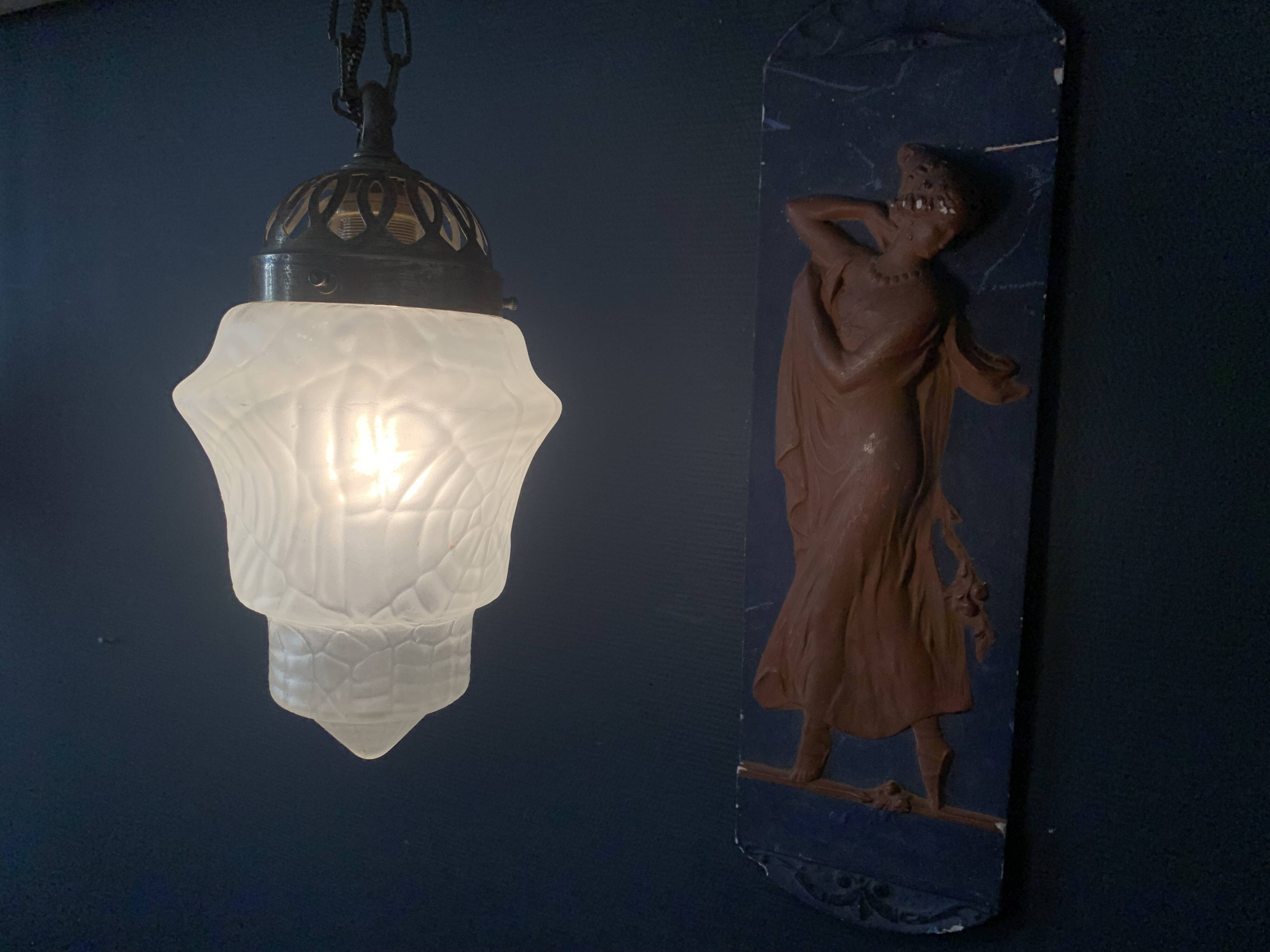 Art Deco pendant light and polished glass spider globe, 1930