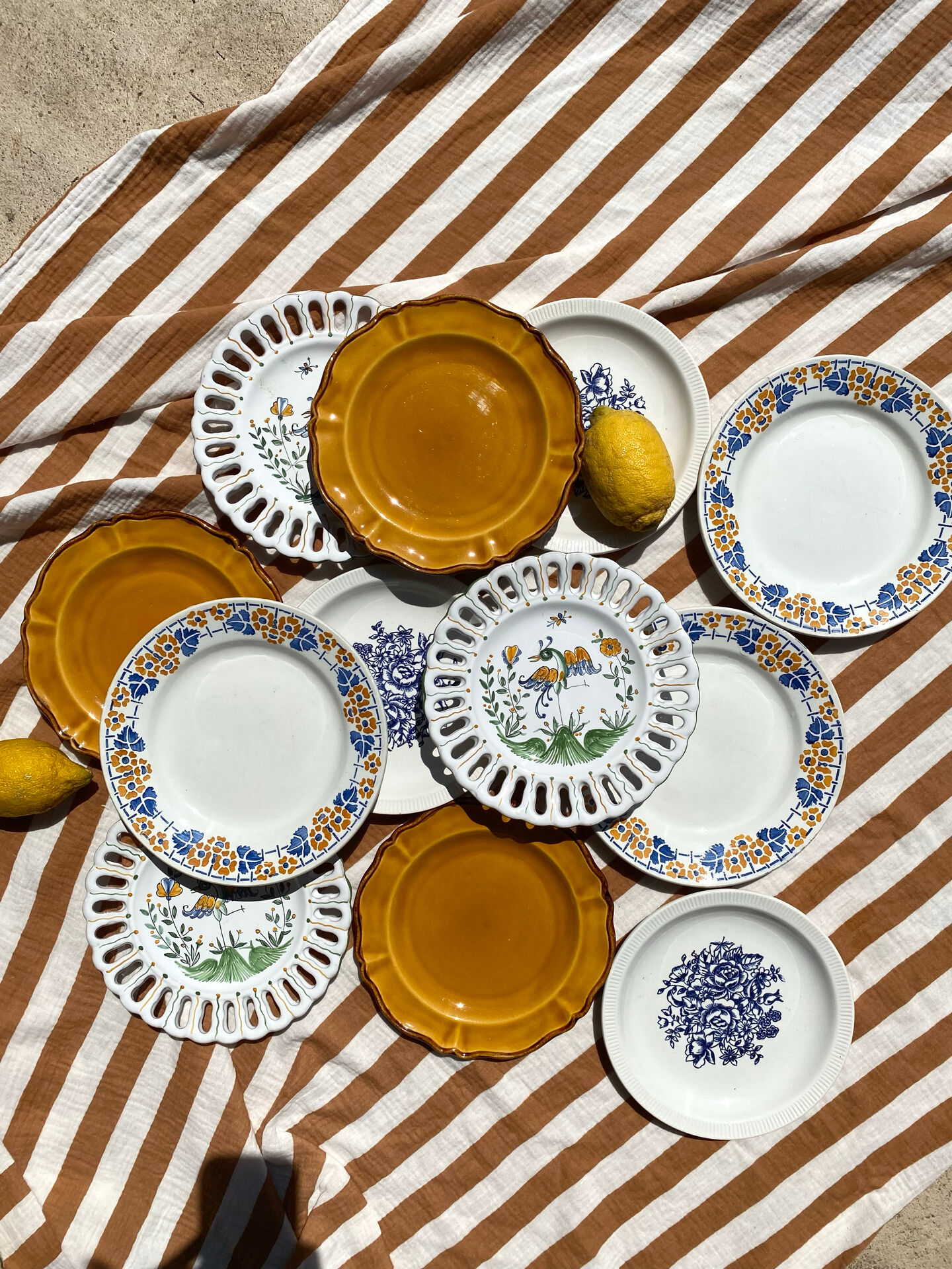 Set of twelve mismatched vintage dessert plates.