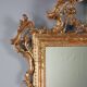 Antique carved and gilded wooden mirror, Italy, early 20th century.
