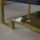 Designer coffee table with brass structure and black smoked glass, 1970s