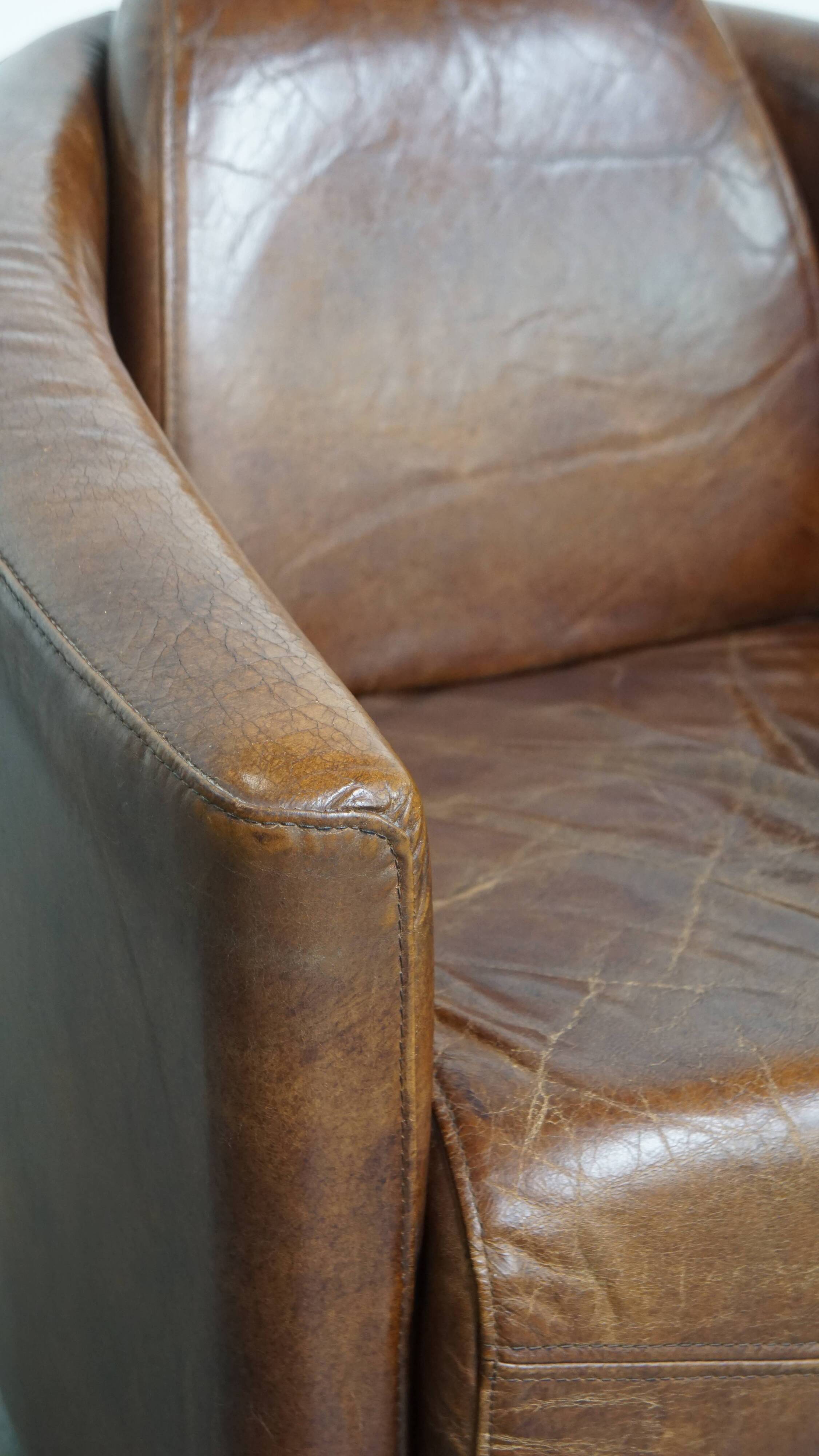 Brown Aviator design armchair made of cowhide leather