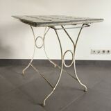 White wrought iron table