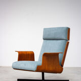Pair of modernist teak lounge chairs and poufs 1960