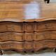 Louis XV style crossbow chest of drawers stamped in solid cherry wood