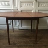 Vintage table with central extension