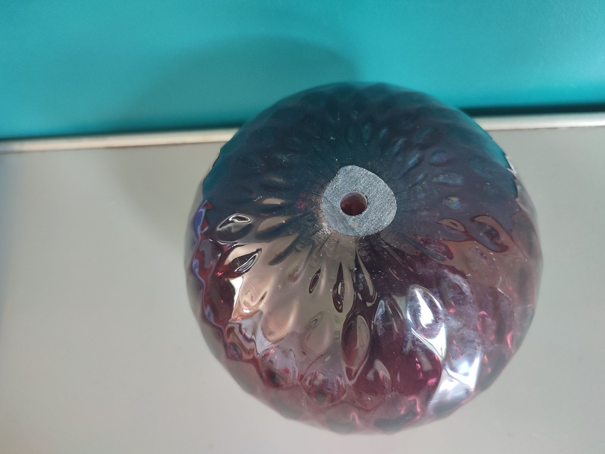 Old plum color blown glass ball