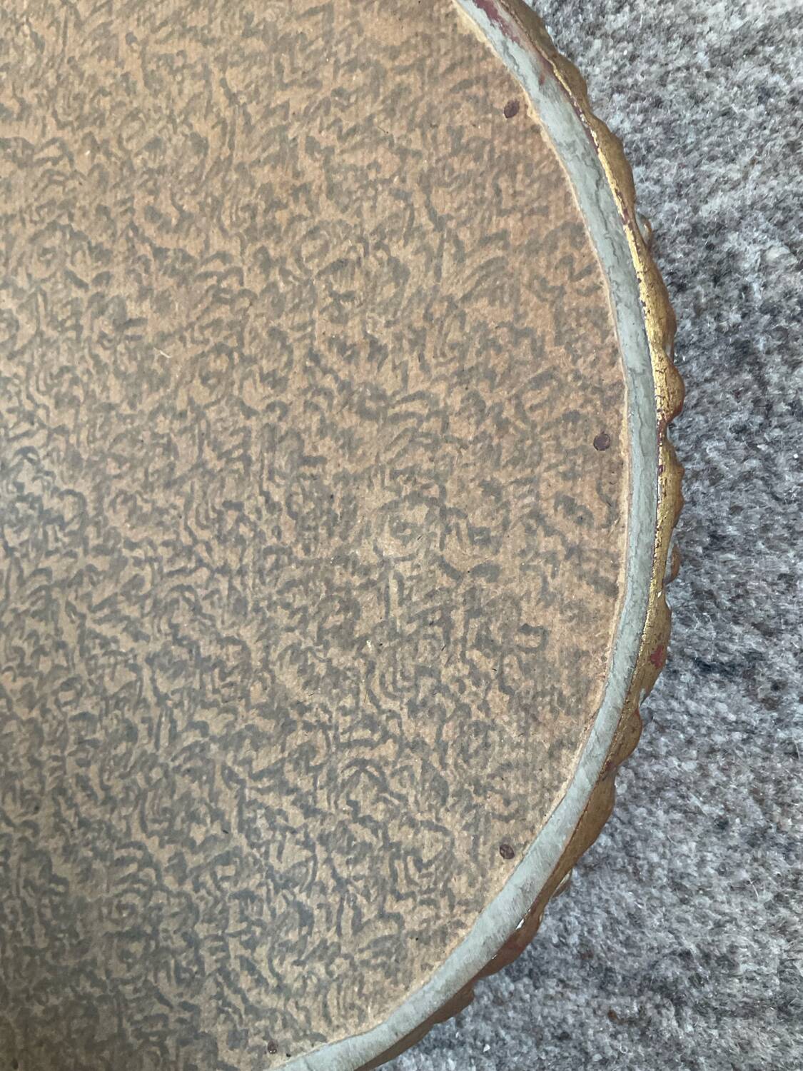 Antique domed witch's eye mirror in gilded wood