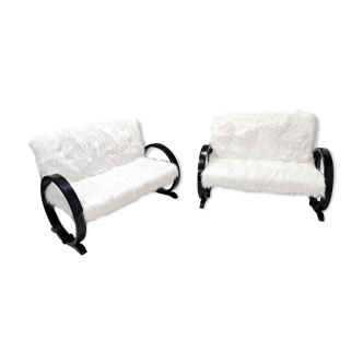 Midcentury faux white fur sofa with black wooden frame, italy