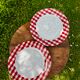 Set of two red checkered porcelain dessert plates by Barbier.