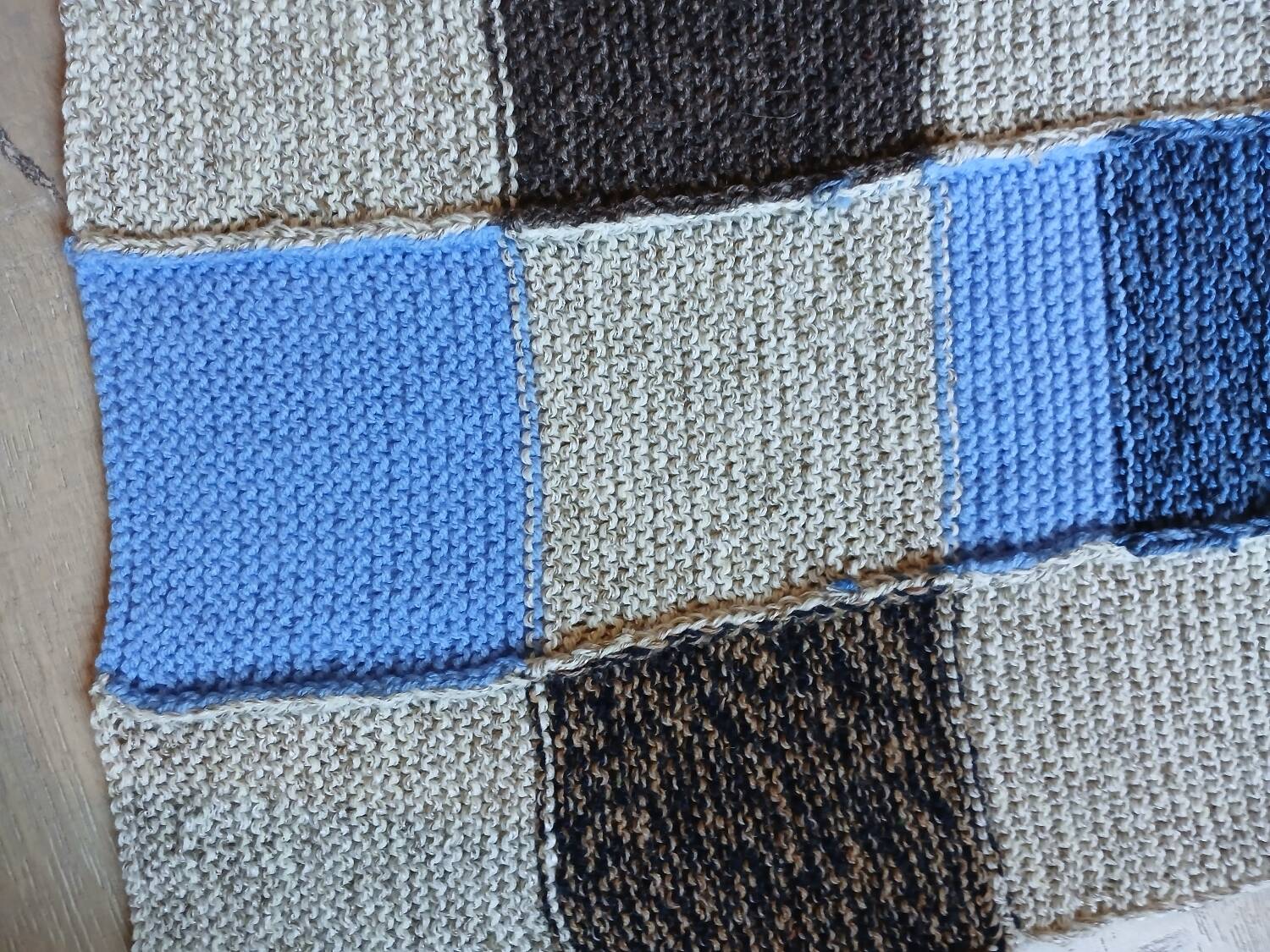 Hand knitted patchwork plaid