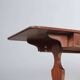 Antique mahogany desk with ebony and maple finishes, United Kingdom, 20th century.