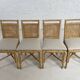 Suite de 4 chaises en rotin cannage et laiton