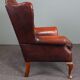 Fauteuil Chesterfield en cuir de vachette