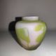 Small E. Gallé vase, "star" signature, light green tone on white background.