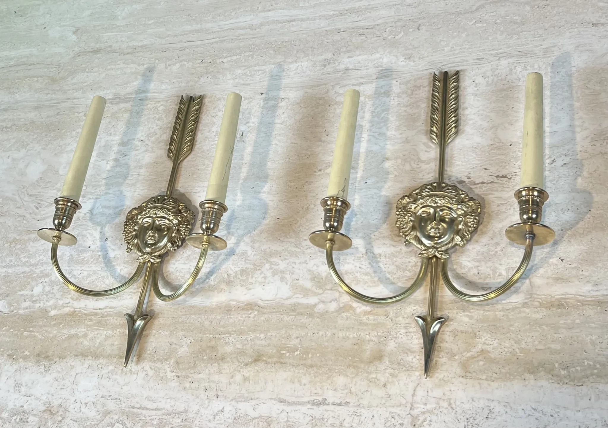 Pair of Two-Arm Bronze Wall Lights with Arrow and Mask Decoration