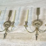 Pair of Two-Arm Bronze Wall Lights with Arrow and Mask Decoration