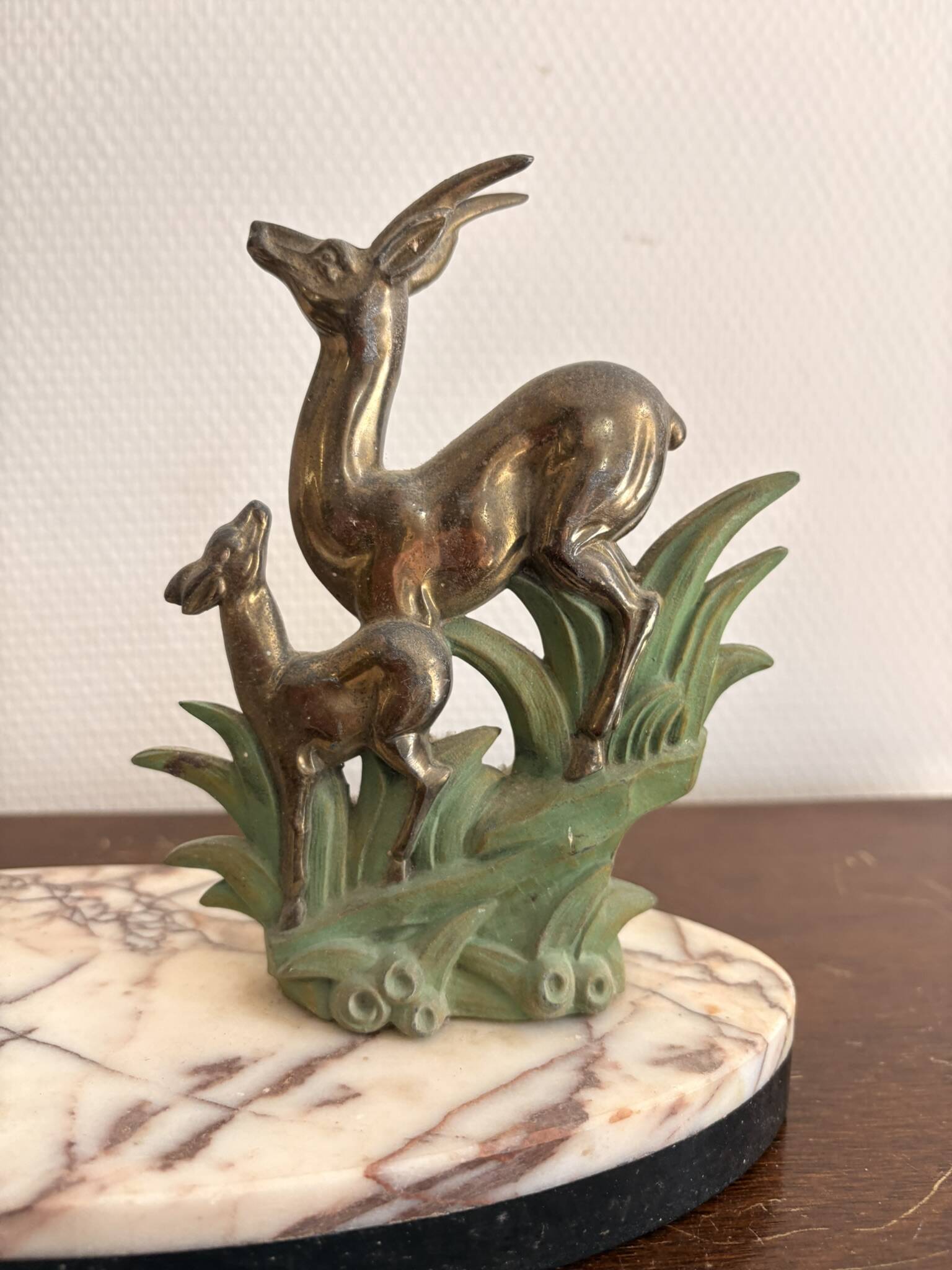Antique Art Deco table lamp in marble and pink glass featuring a deer.