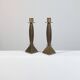 Pair of hand-hammered brass candlesticks in Memphis style.