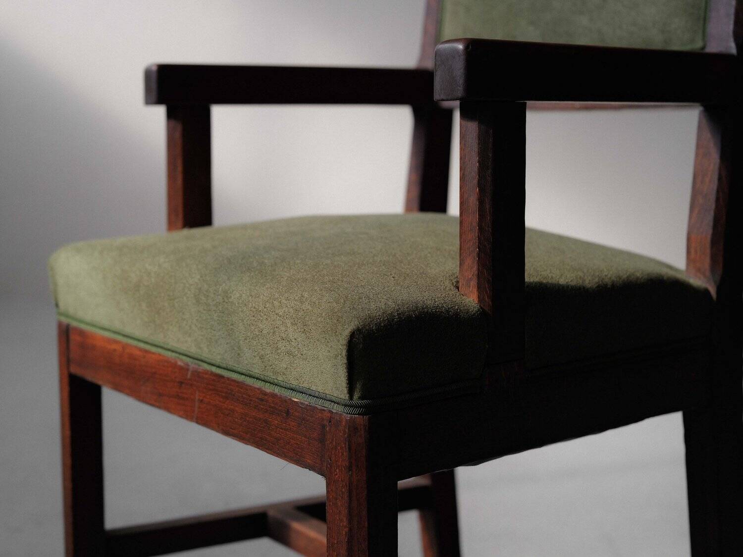 Pair of modernist armchairs in solid oak, France, circa 1940.