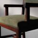 Pair of modernist armchairs in solid oak, France, circa 1940.