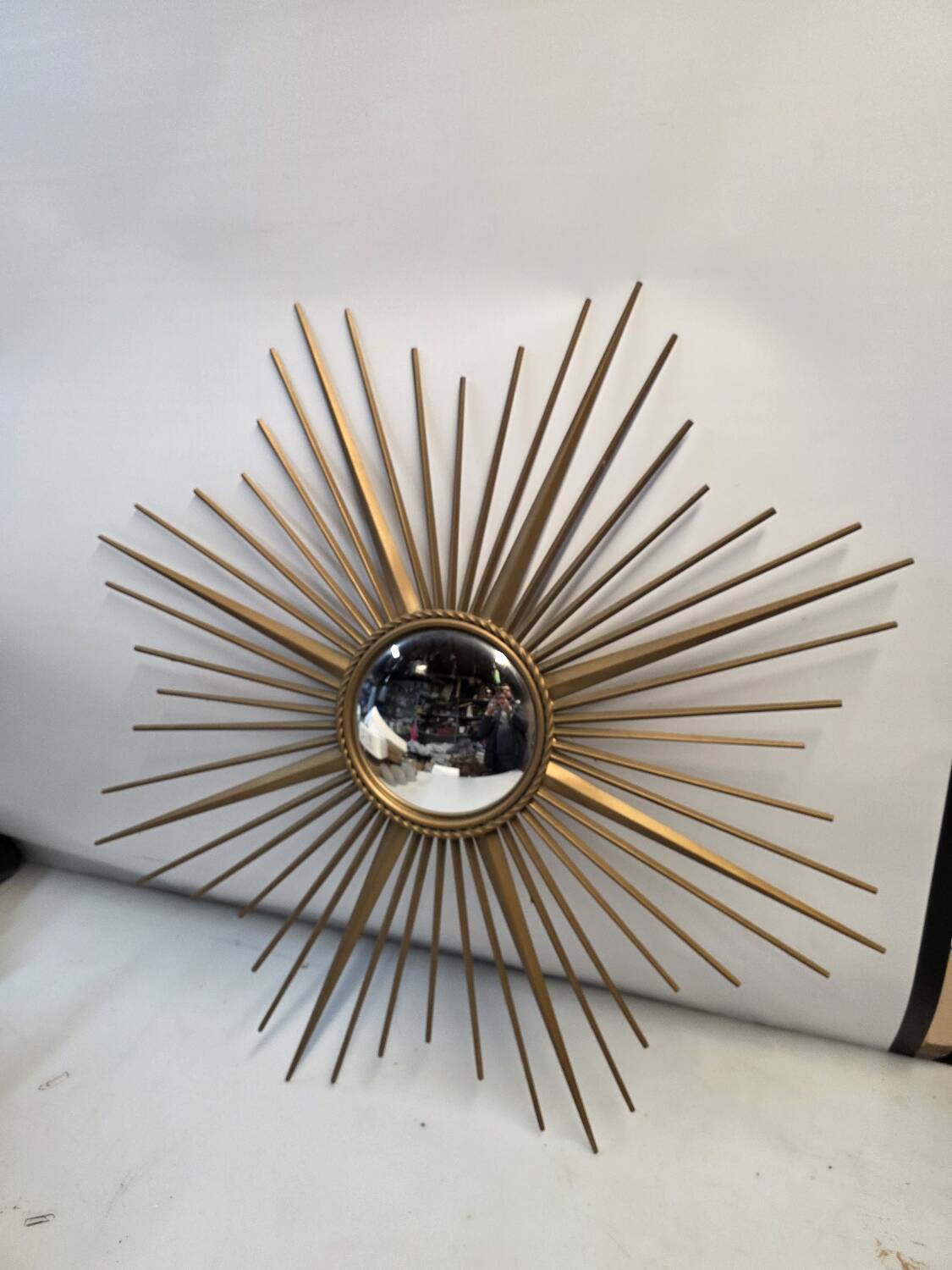Golden metal witch's eye sun mirror from the 70s, 86cm.