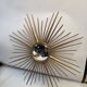 Golden metal witch's eye sun mirror from the 70s, 86cm.