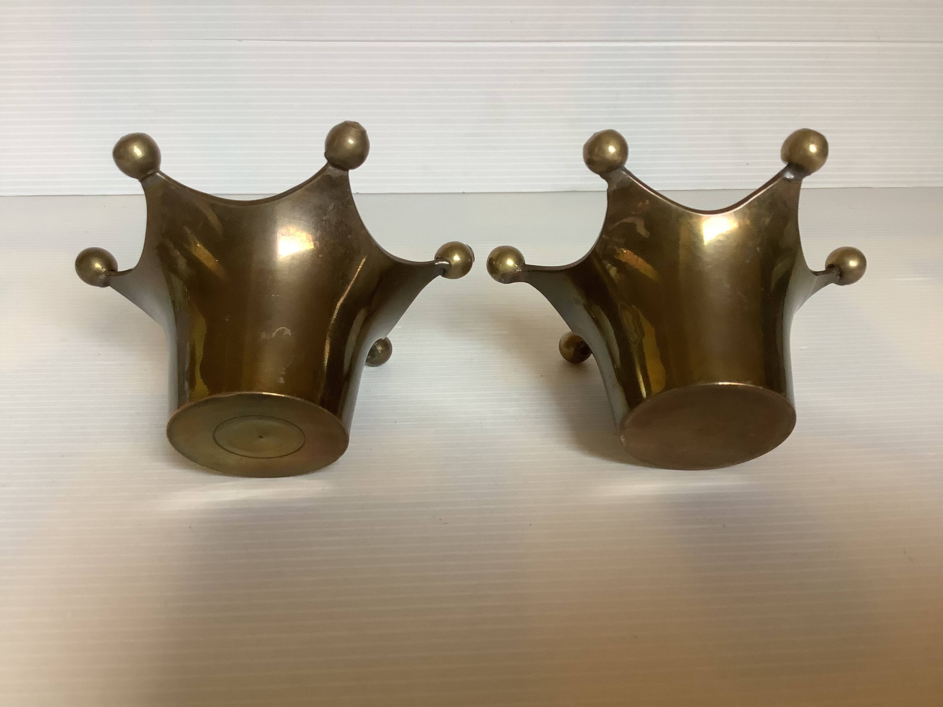 Pair of brass crown candlesticks