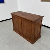 Two-sided paneled counter, bottle storage