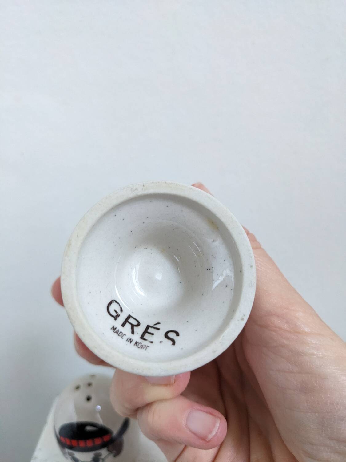 Egg cup, salt and pepper shaker duo