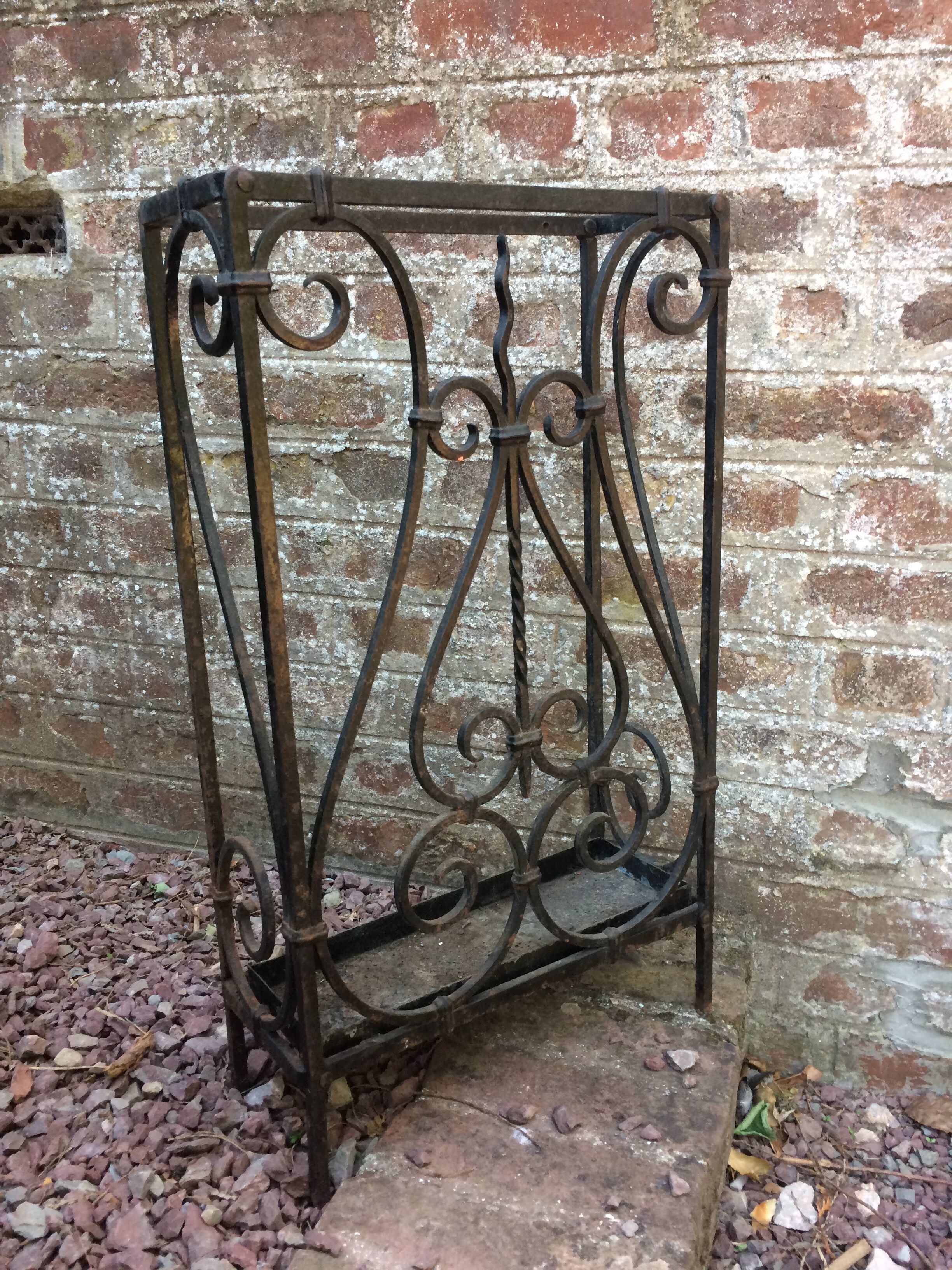 Art-deco forged iron umbrella holder