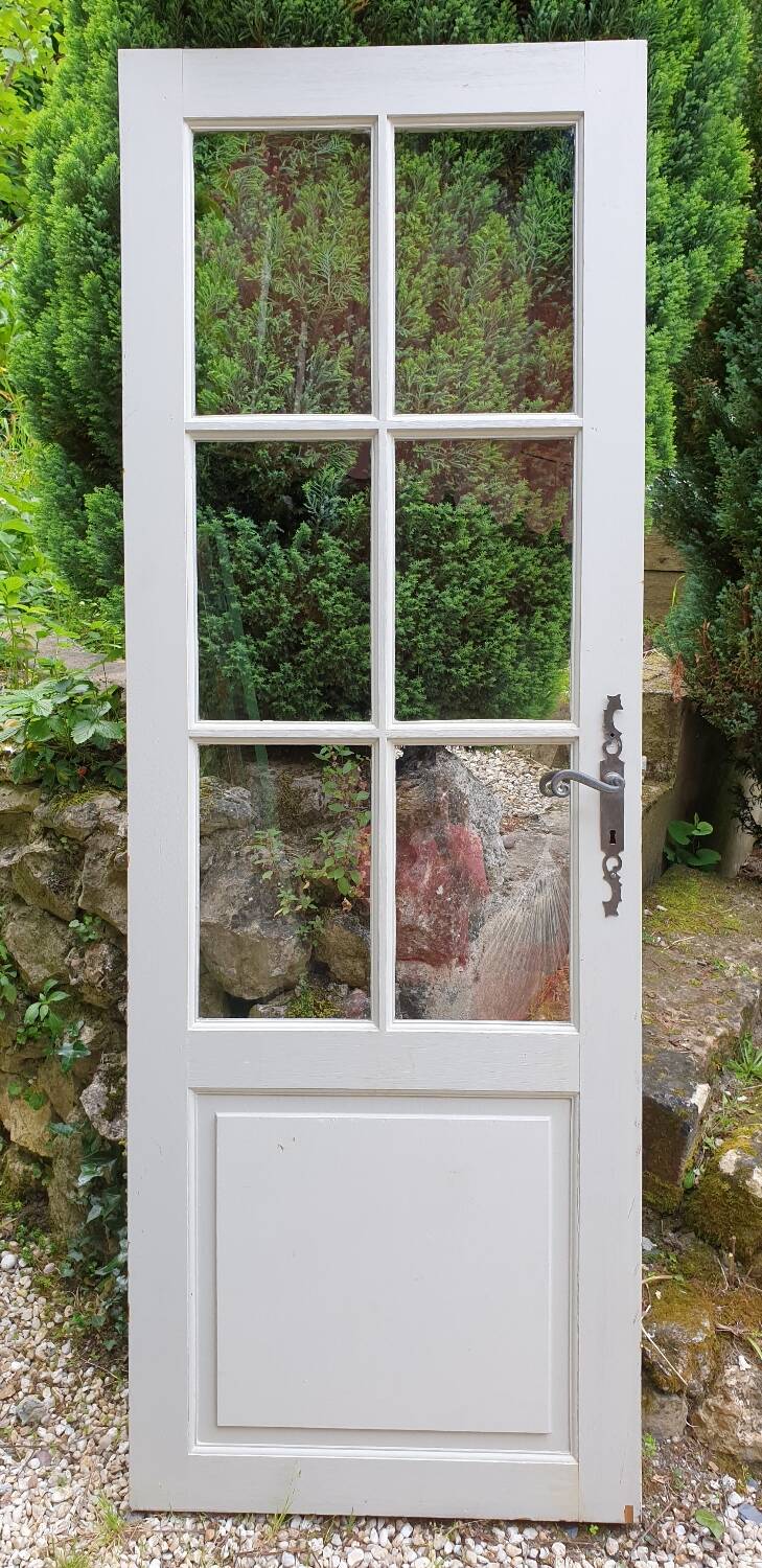 Old wooden door with small squares