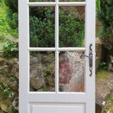 Old wooden door with small squares