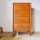 Commode vintage années 50 en bois – 4 tiroirs – pieds compas