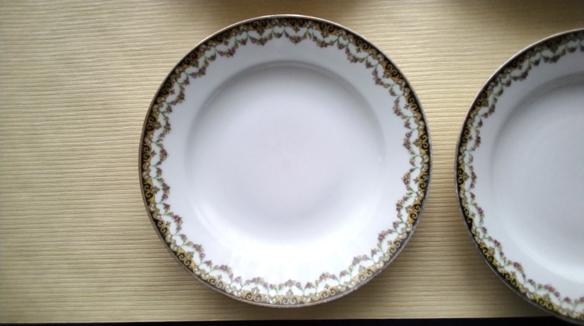 Set of 4 antique hollow plates in Limoges ULM porcelain