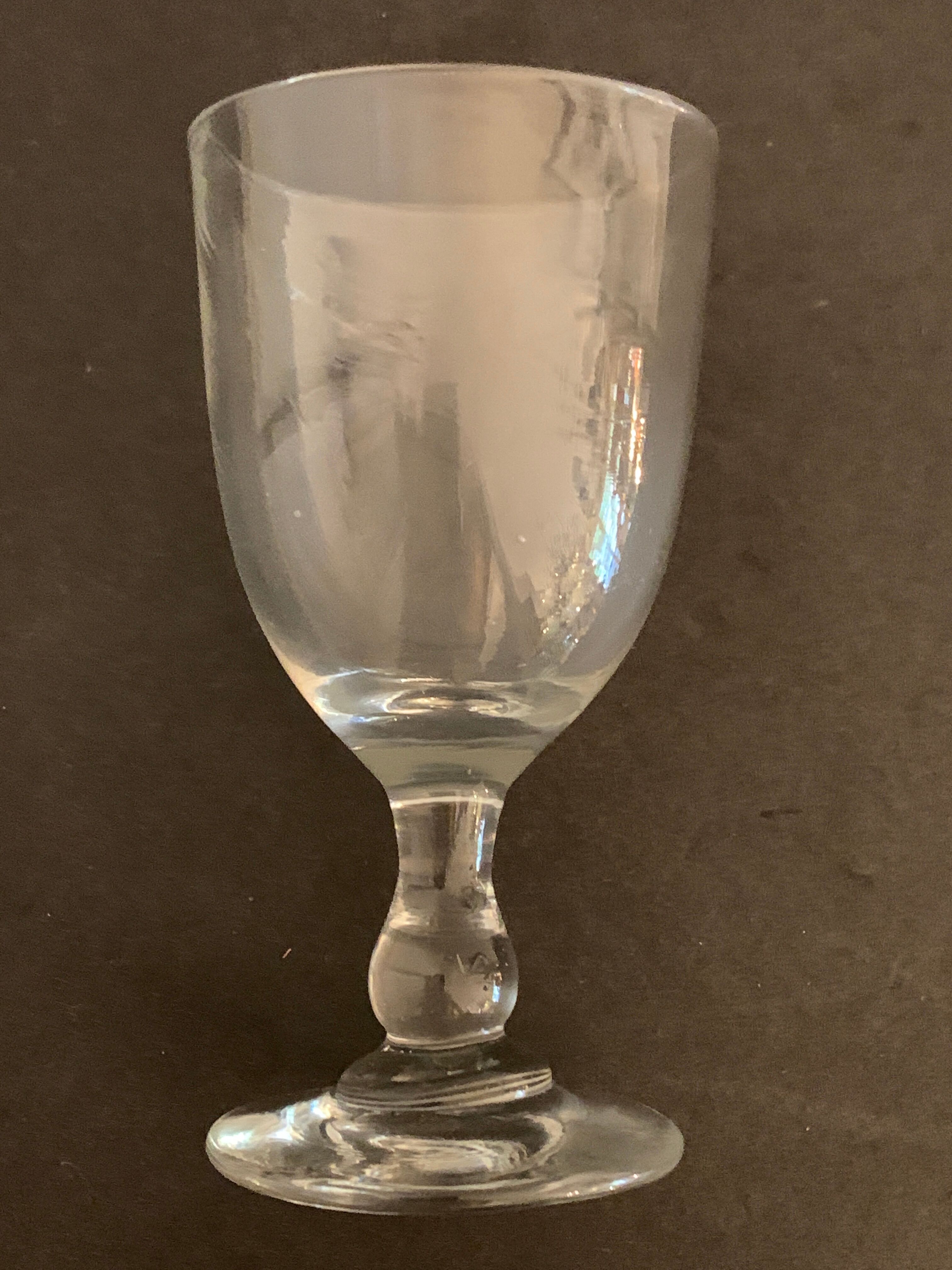 7 antique blown foot glasses