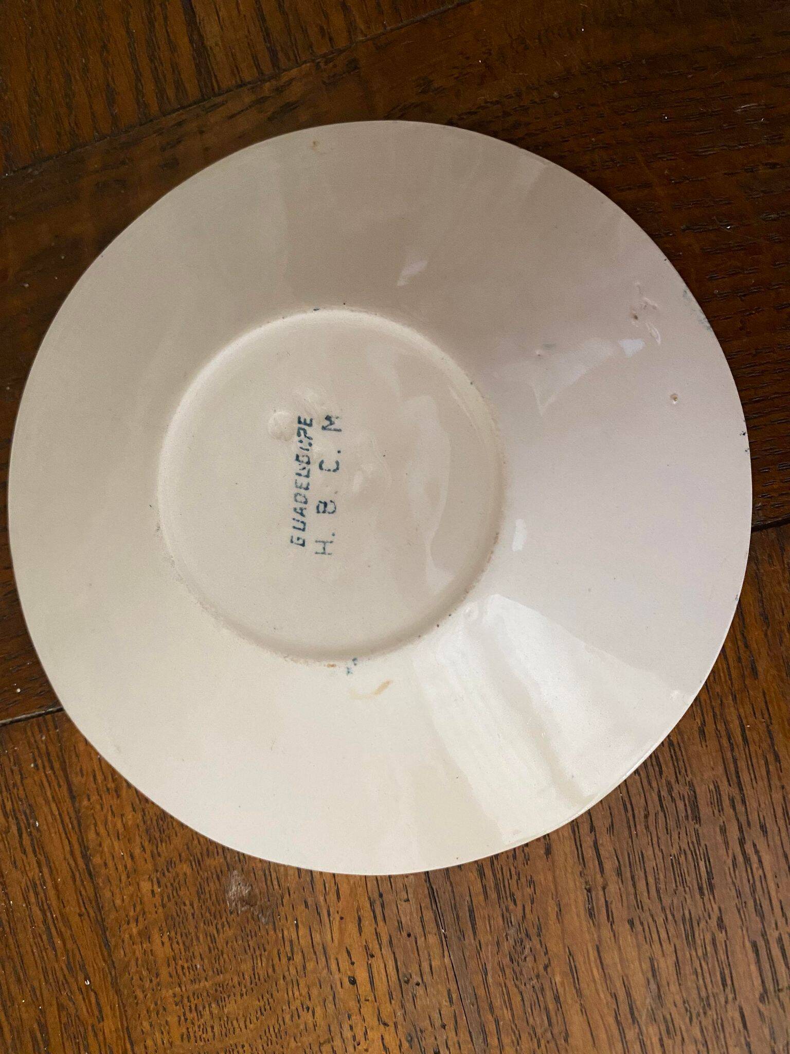 Cup and saucer old Iron earth stamped H.B.C.M Guadeloupe decoration flowers blue-green