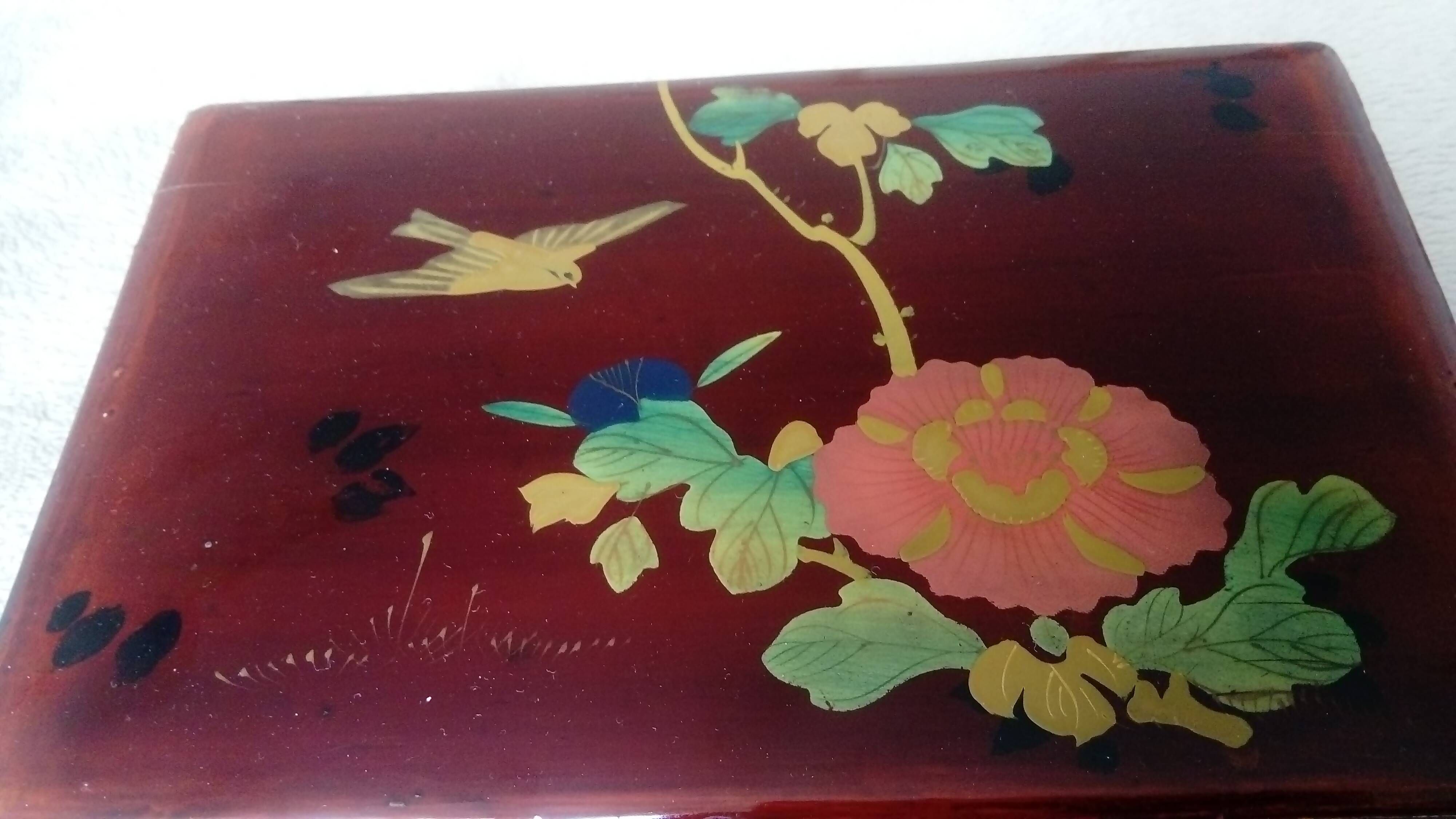 Old lacquered wooden box with china or japan decoration, bird and flower