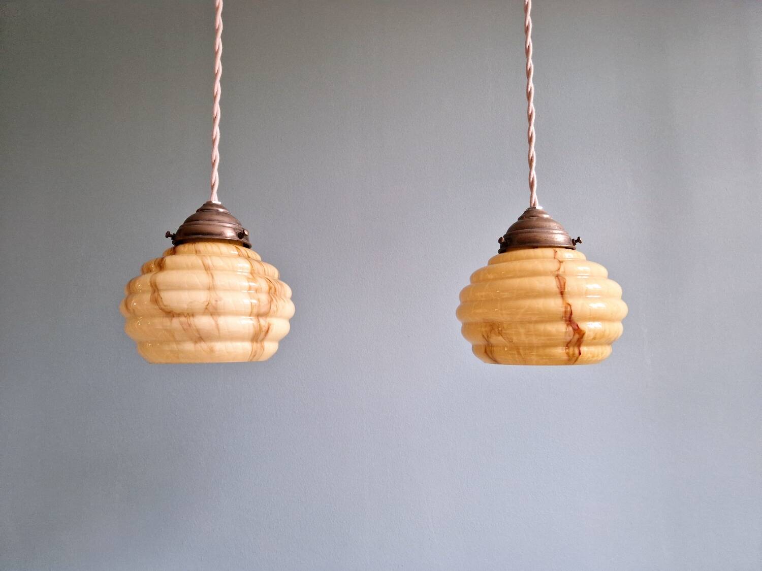 Pair of Art Deco marbled opaline pendant lights, 1920s-30s