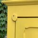 Antique powder yellow Parisian bonnetière wardrobe.